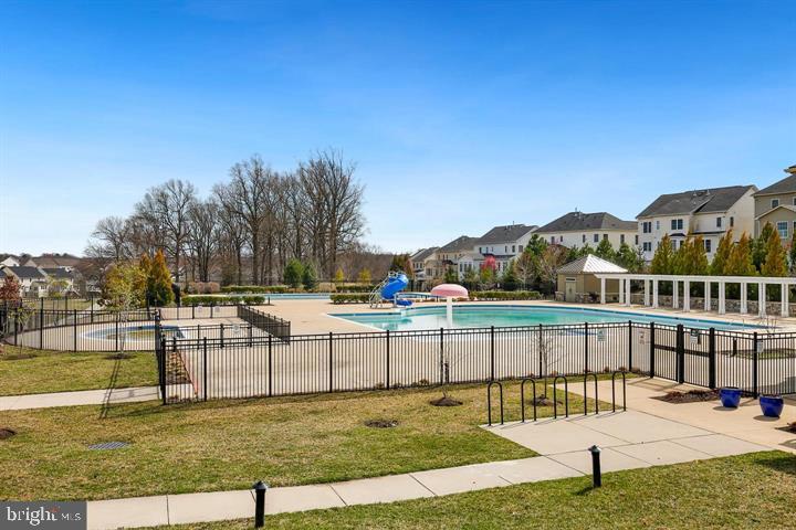 1609 Poplar Run Drive Silver Spring, MD 20906 - Photo 65 of 71 a view of a swimming pool with an outdoor seating