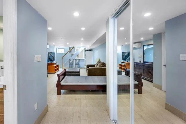 a kitchen with granite countertop a stove sink and cabinets