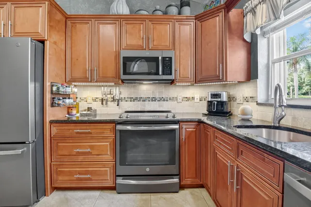 a bed room with a bed and a television