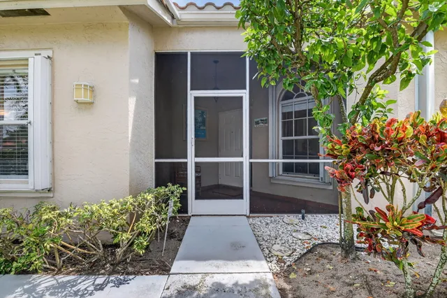 a view of front door with furniture