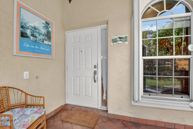 a view of a livingroom with furniture and windows