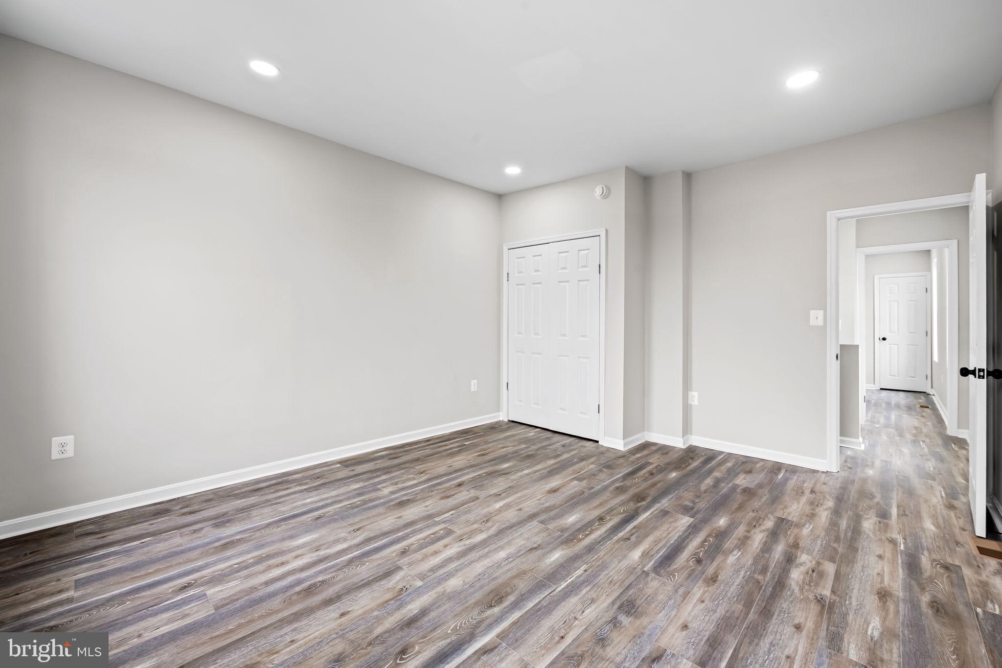 1918 East Lafayette Avenue Baltimore, MD 21213 - Photo 15 of 30 a view of room with wooden floor