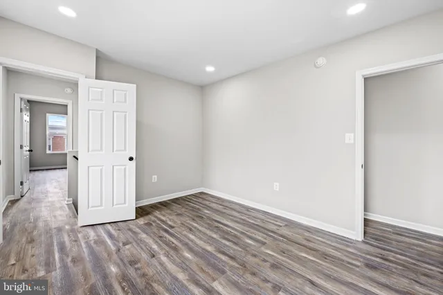 a view of wooden floor in an empty room
