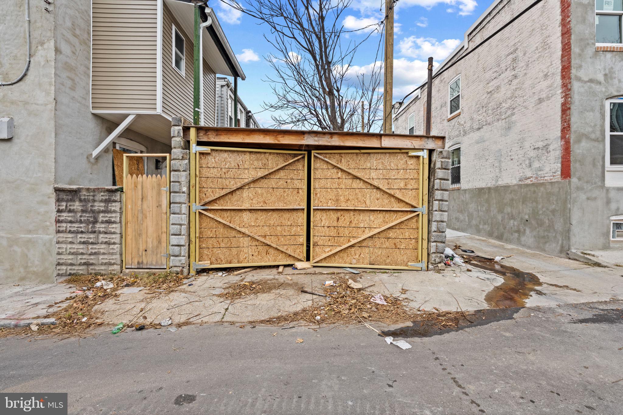 1918 East Lafayette Avenue Baltimore, MD 21213 - Photo 29 of 30 a view of a backyard door of the house