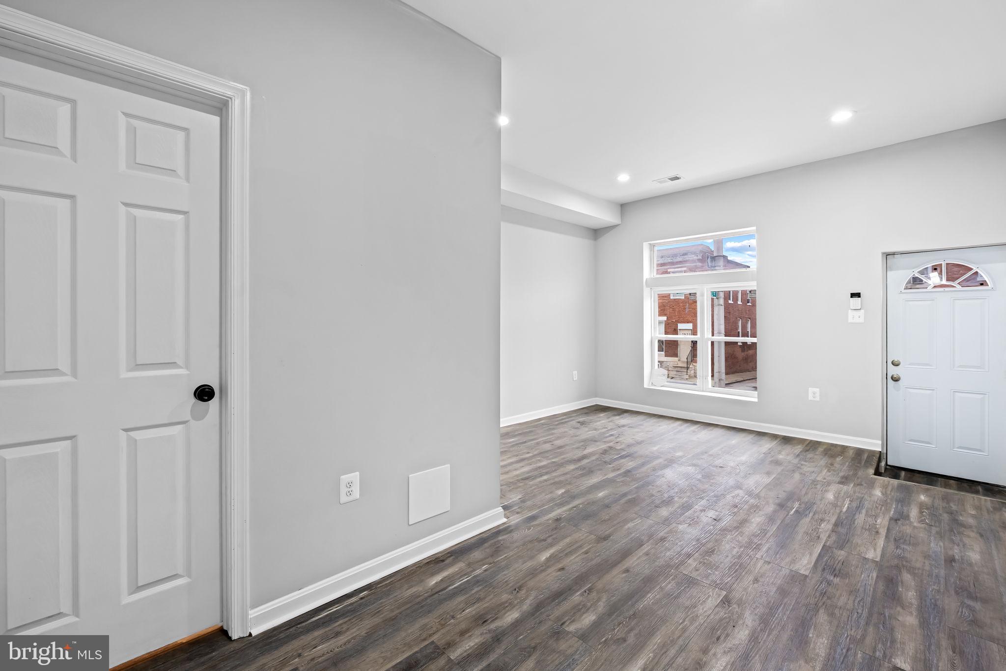 1918 East Lafayette Avenue Baltimore, MD 21213 - Photo 3 of 30 wooden floor in an empty room