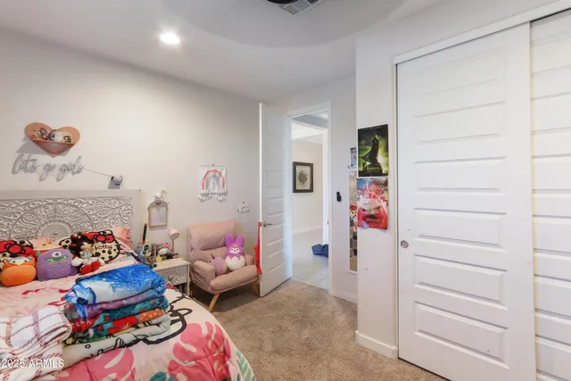 a bedroom with furniture and a couch