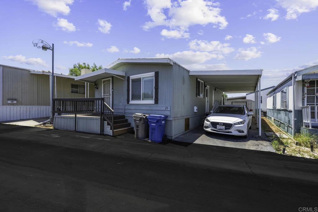 7908 Rancho Fanita Drive, Unit SPC 25 Santee, CA 92071 - Photo 12 of 19 a view of a car park in front of house