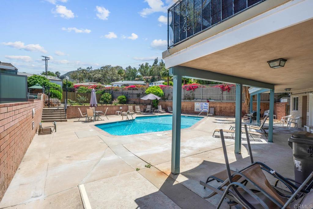 7908 Rancho Fanita Drive, Unit SPC 25 Santee, CA 92071 - Photo 15 of 19 a view of a patio with table and chairs potted plants