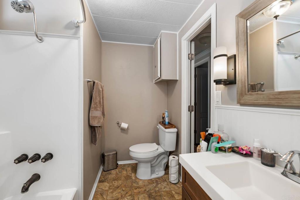 7908 Rancho Fanita Drive, Unit SPC 25 Santee, CA 92071 - Photo 8 of 19 a bathroom with a sink toilet and shower