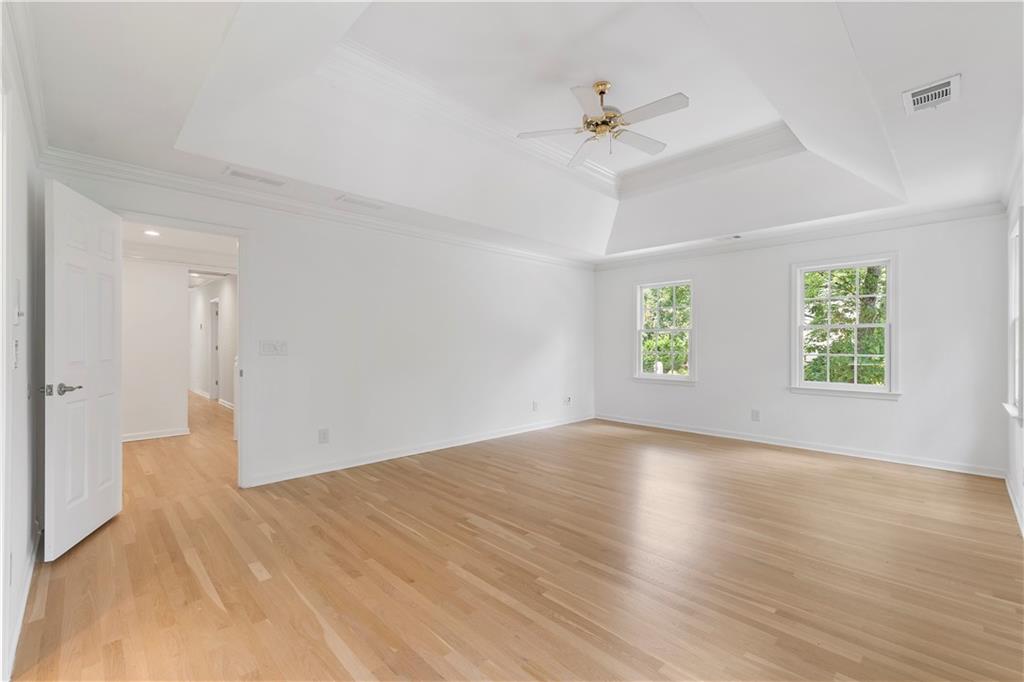 8965 Laurel Way Alpharetta, GA 30022 - Photo 29 of 79 wooden floor in an empty room with a window