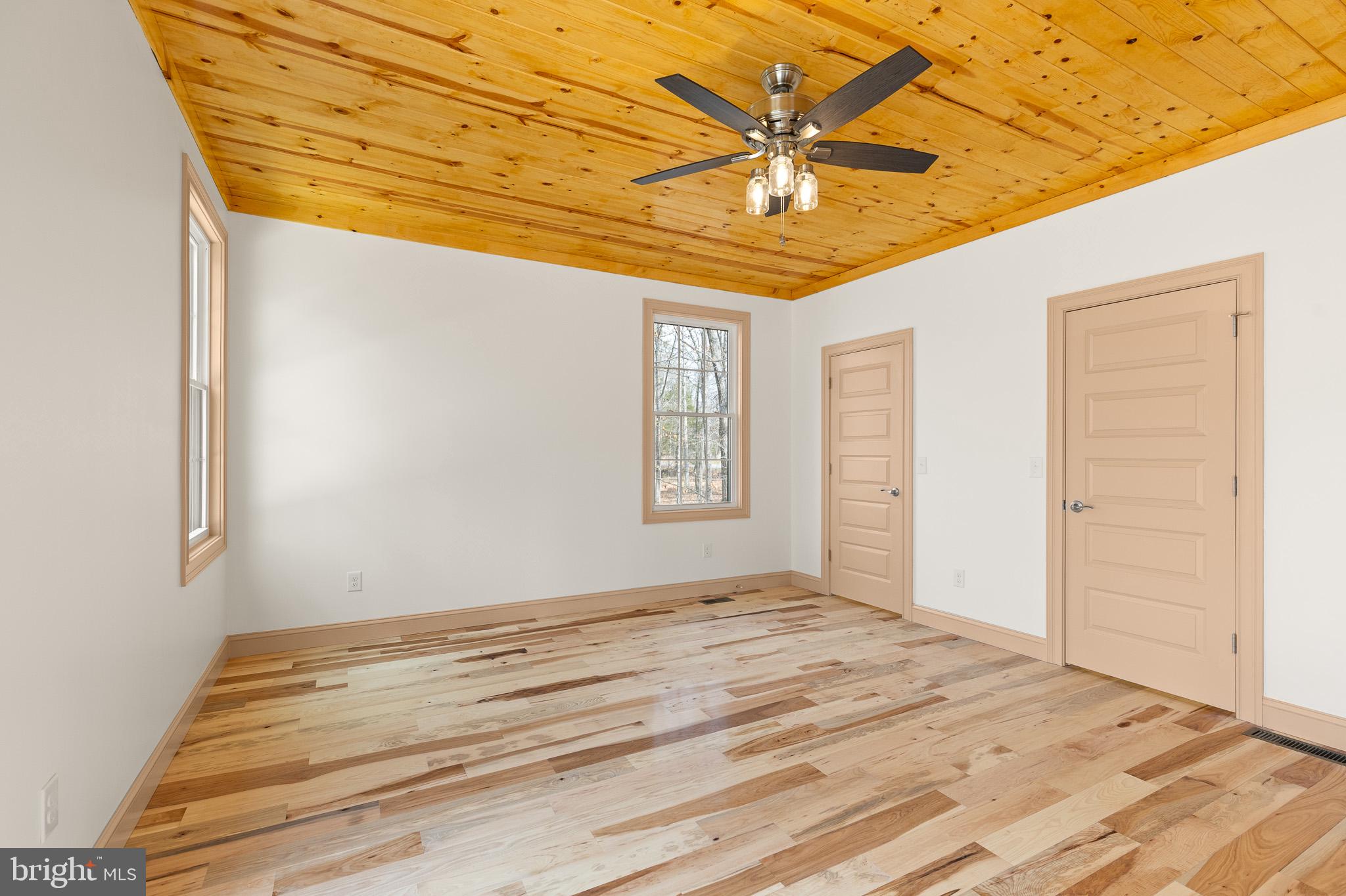 8399 Supinlick Ridge Road Mount Jackson, VA 22842 - Photo 16 of 39 Bright, airy room with wooden accents.