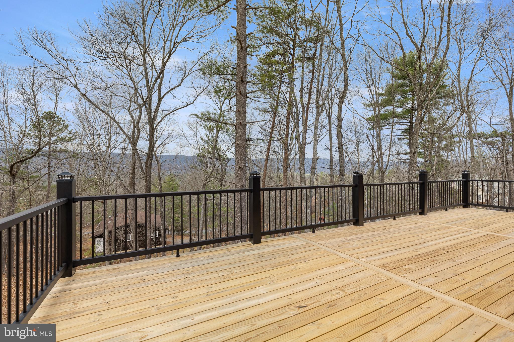 8399 Supinlick Ridge Road Mount Jackson, VA 22842 - Photo 24 of 39 Serene deck with wooded views.