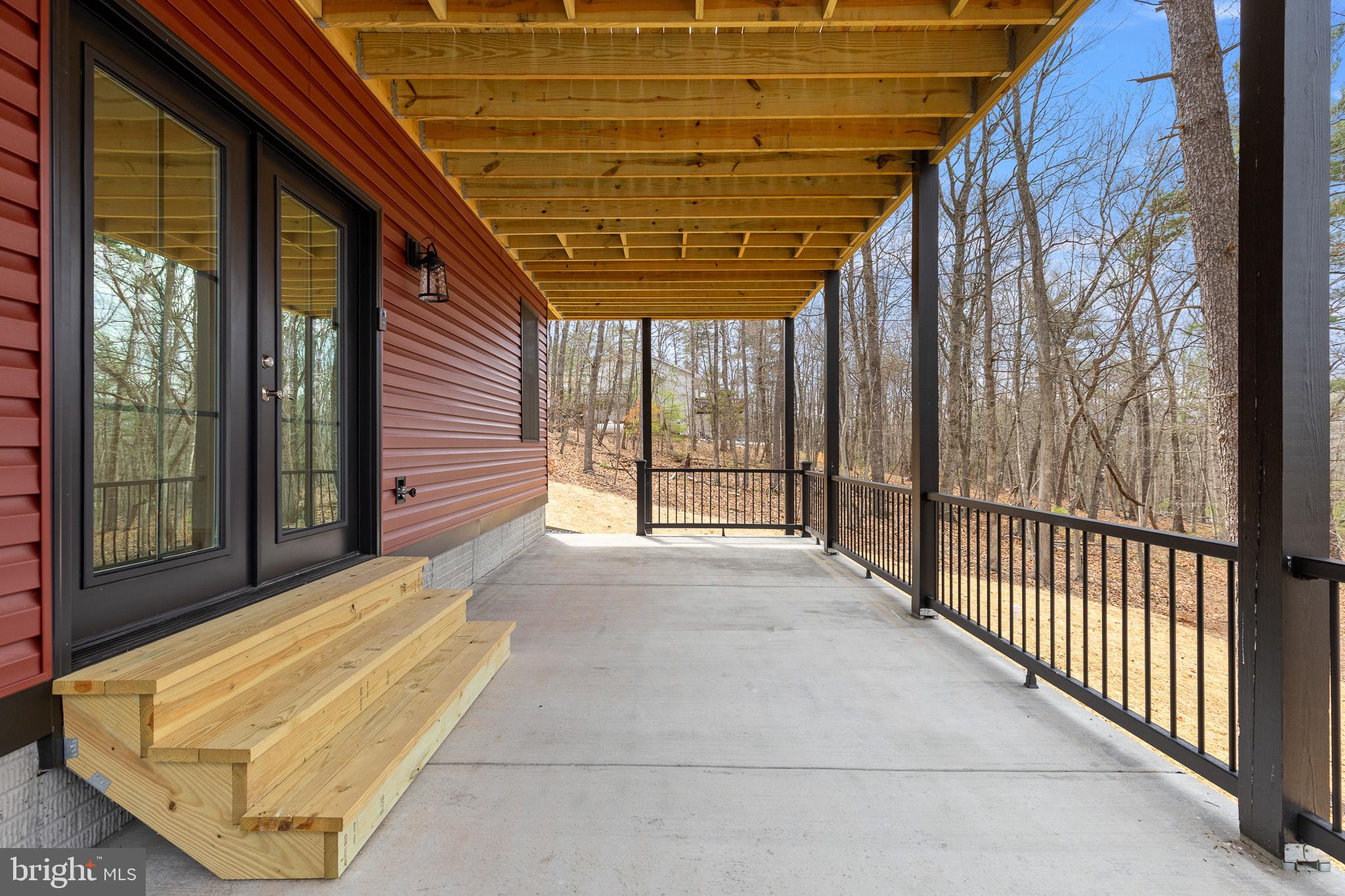 8399 Supinlick Ridge Road Mount Jackson, VA 22842 - Photo 27 of 39 Inviting porch w/ access to family/game room area