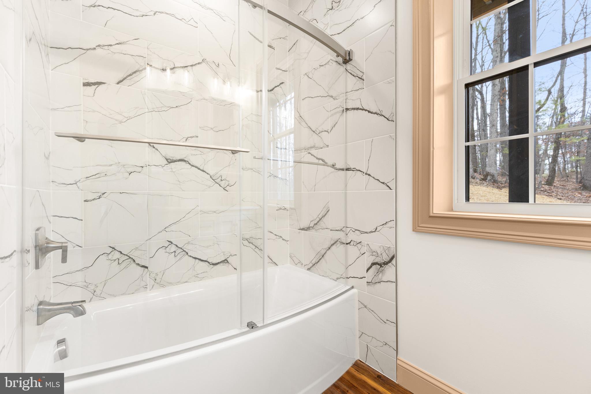 8399 Supinlick Ridge Road Mount Jackson, VA 22842 - Photo 32 of 39 Elegant bath with marble accents.