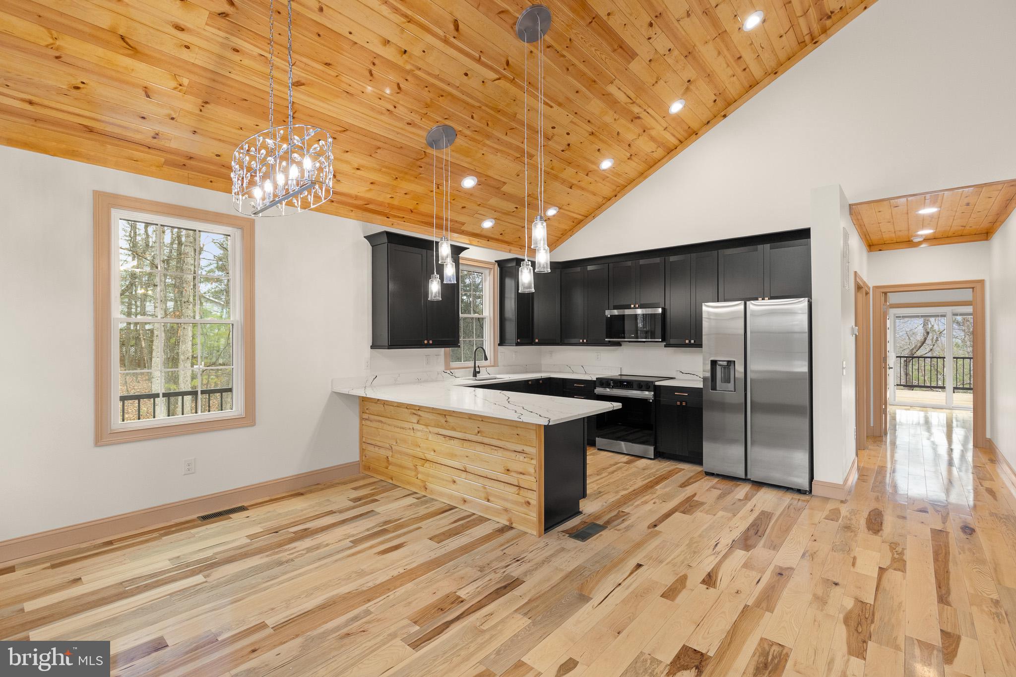 8399 Supinlick Ridge Road Mount Jackson, VA 22842 - Photo 9 of 39 Modern kitchen with rustic charm.