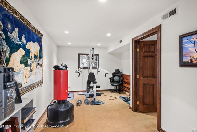 a view of a room with gym equipment