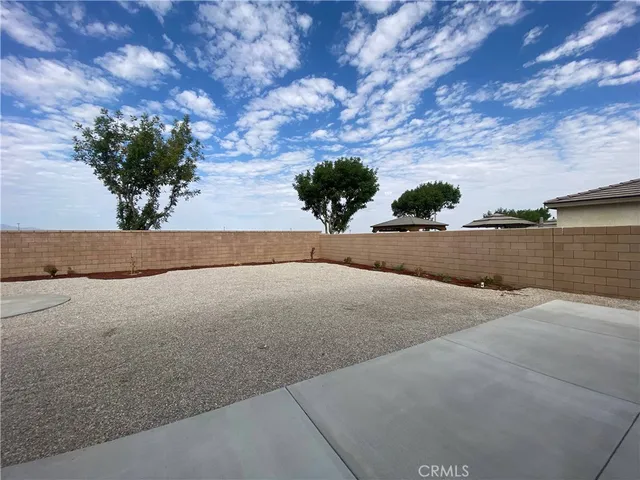 a living room with furniture and windows