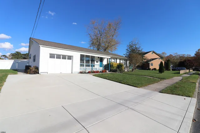 a view of house with outdoor space and porch