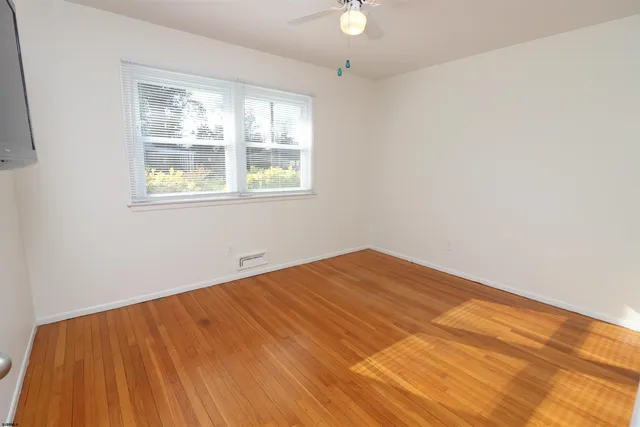 an empty room with window