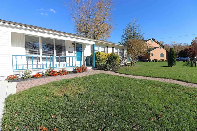 a house view with a garden space