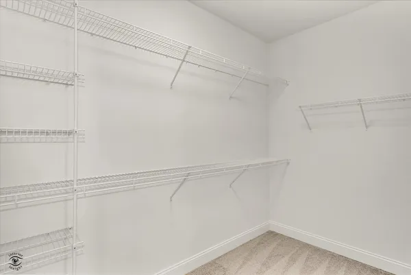 a bathroom with a sink double vanity granite tub and shower