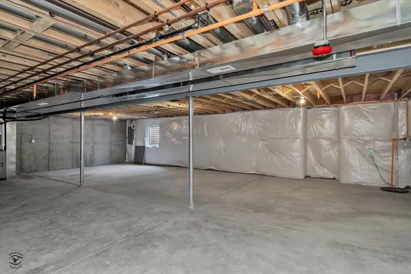 a view of a house with yard and a patio