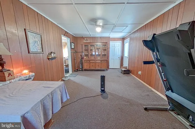 a room with gym equipment and a window