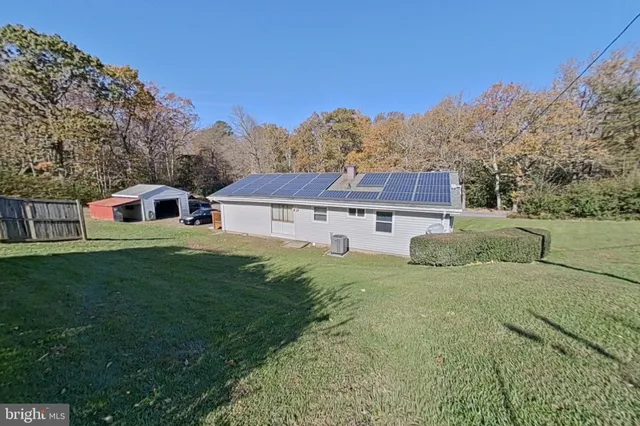a view of a house with a big yard