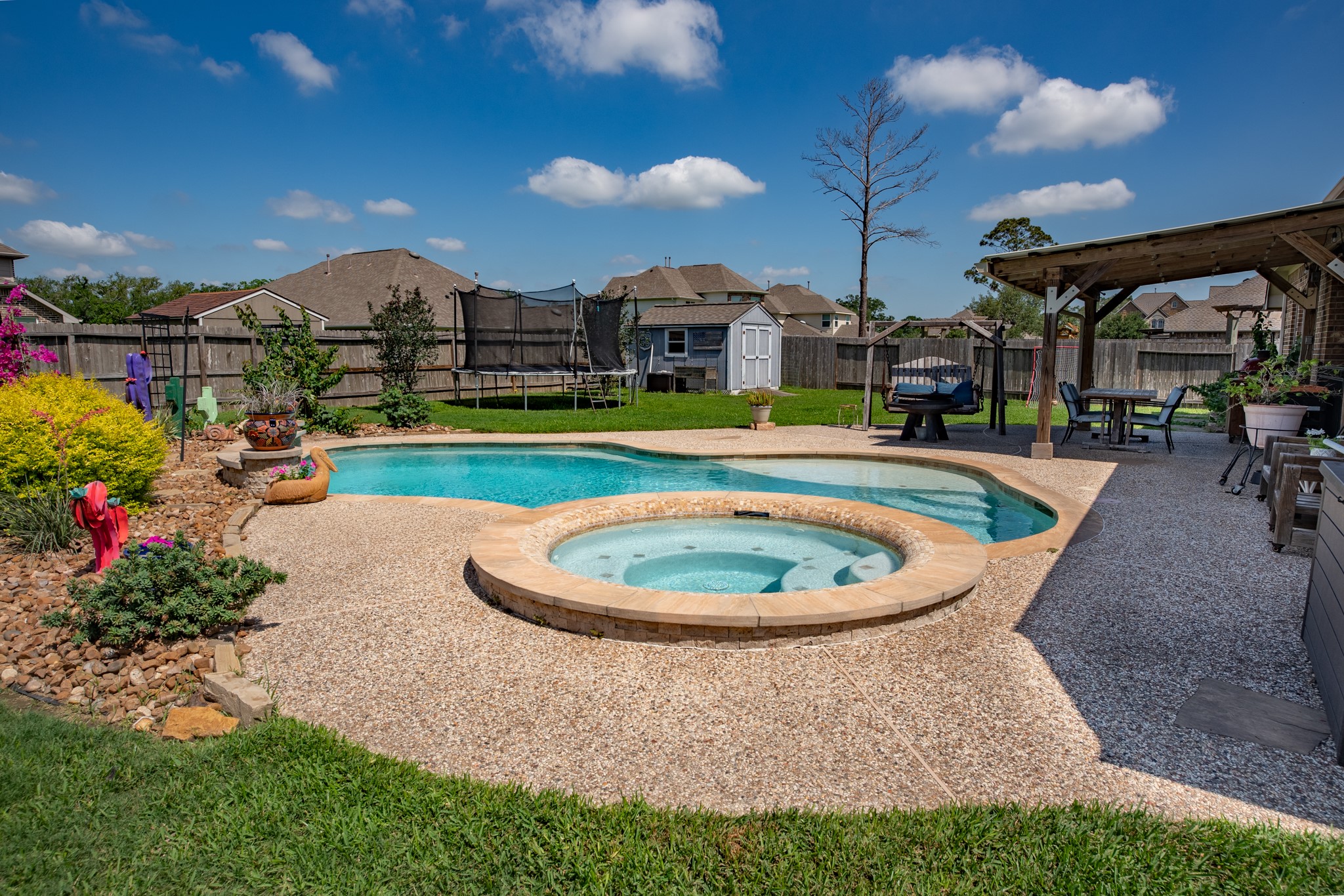 1283 Laurel Lane Angleton, TX 77515 - Photo 33 of 40 Hot Tub for all seasons. Cool down in the Summer, heat up the Pool in the Winter