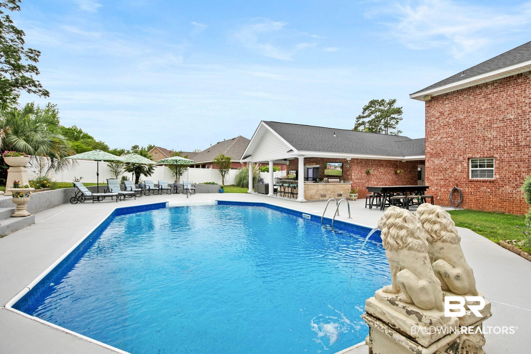 2 Speckle Trout Route Daphne, AL 36527 - Photo 50 of 61 View of swimming pool featuring an outdoor bar and dining area and patio surround