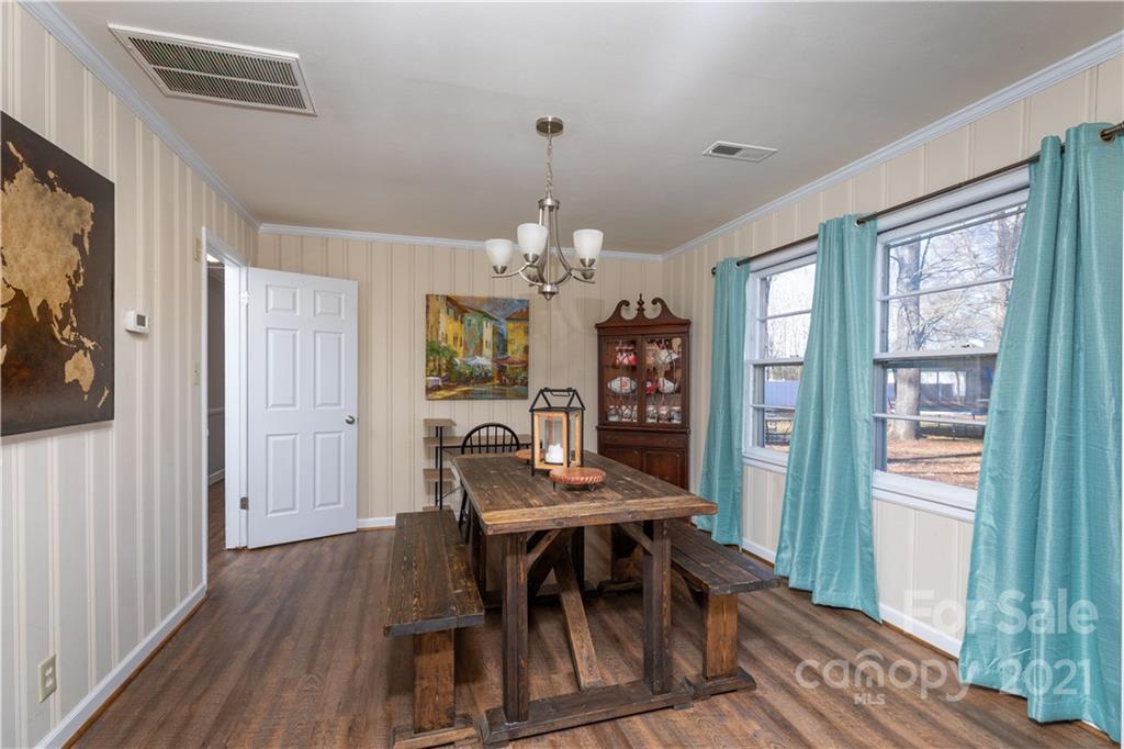 310 West Rambo Road Rock Hill, SC 29730 - Photo 10 of 26 a view of a dining room with furniture window and wooden floor