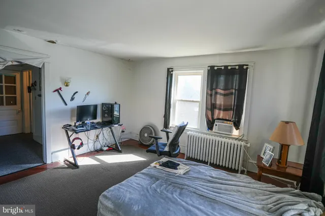 a balcony with chairs and a dinning table