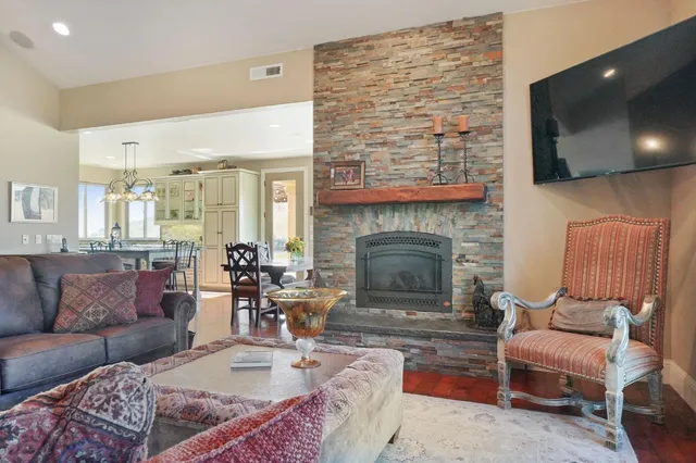 an aerial view of a golf course with parking space