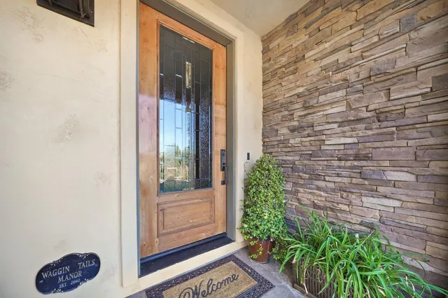 a view of a workspace with furniture