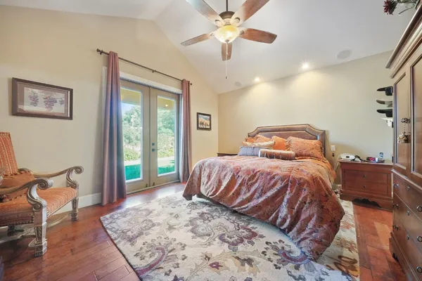 a bed room with a bed and a window