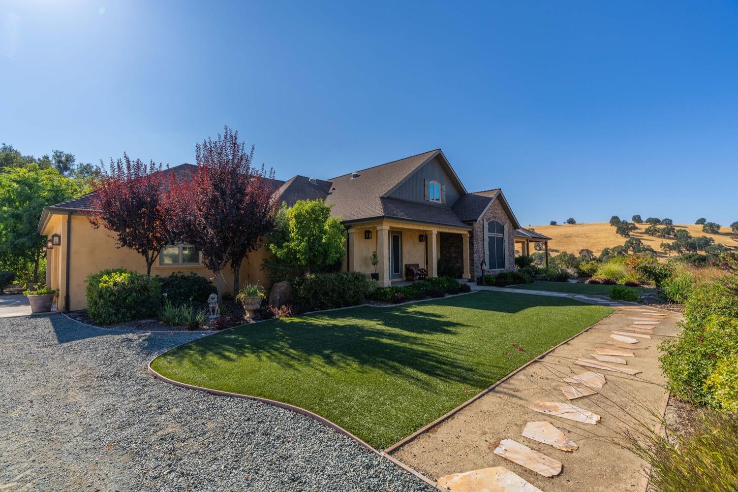 11195 Vintage Road Ione, CA 95640 - Photo 4 of 92 a front view of a house with a yard