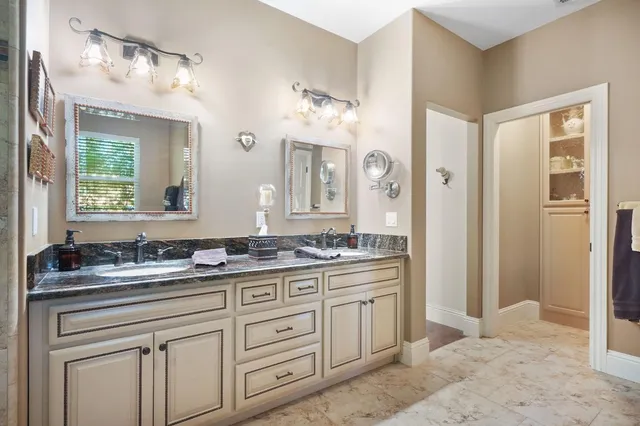 a kitchen with a sink stove and refrigerator