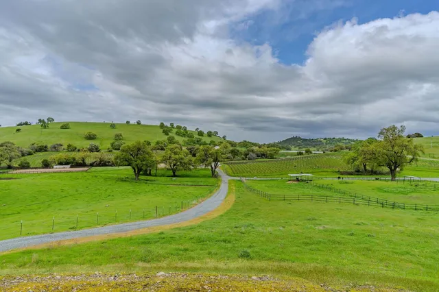 a view of a street with sitting area