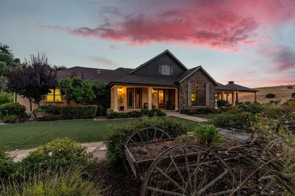 a view of a golf course with a lake