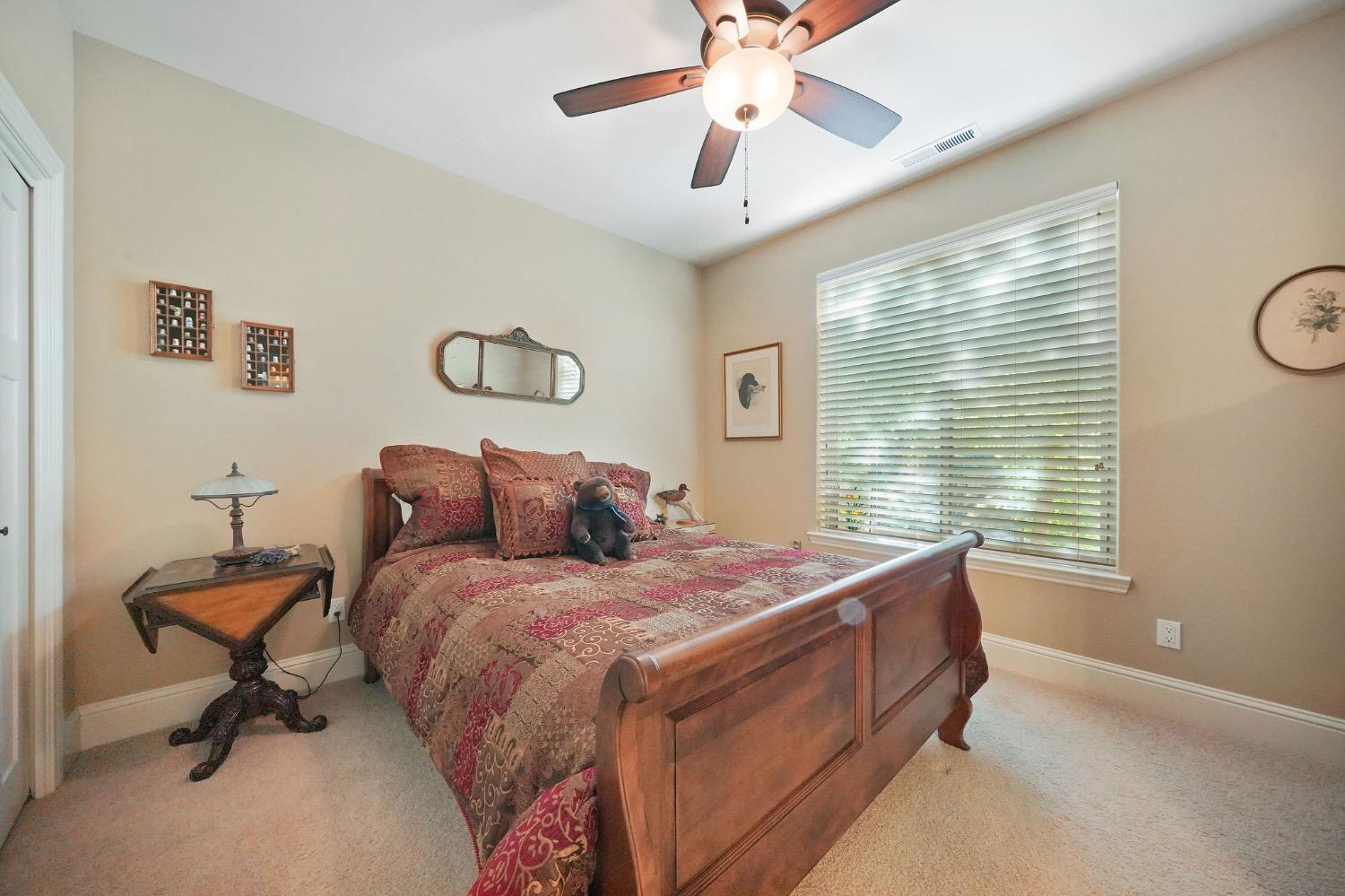 11195 Vintage Road Ione, CA 95640 - Photo 65 of 92 a bed room with a bed and a window