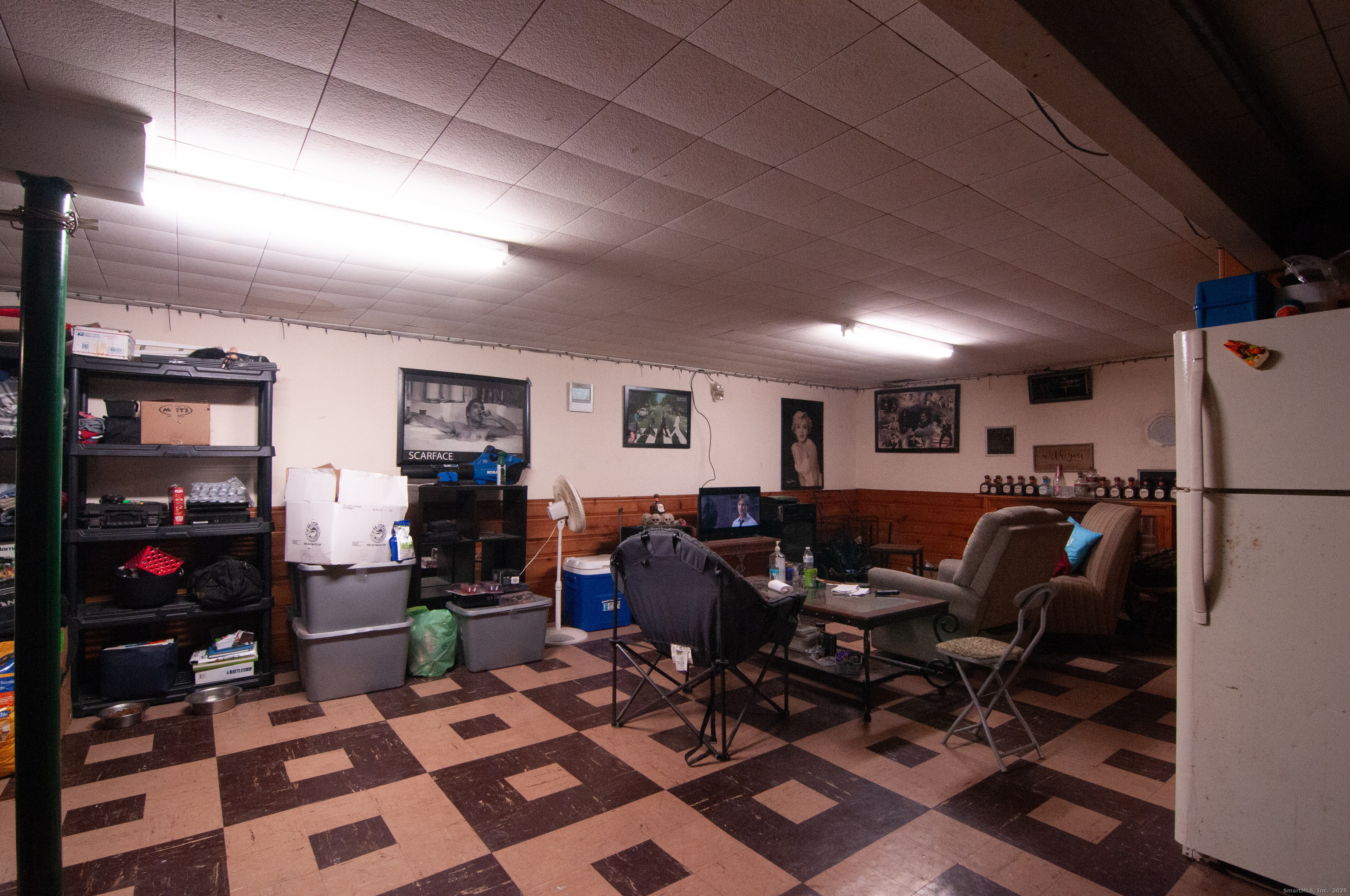 30 Adeline Avenue Bristol, CT 06010 - Photo 12 of 15 a living room with lots of furniture and gym equipment