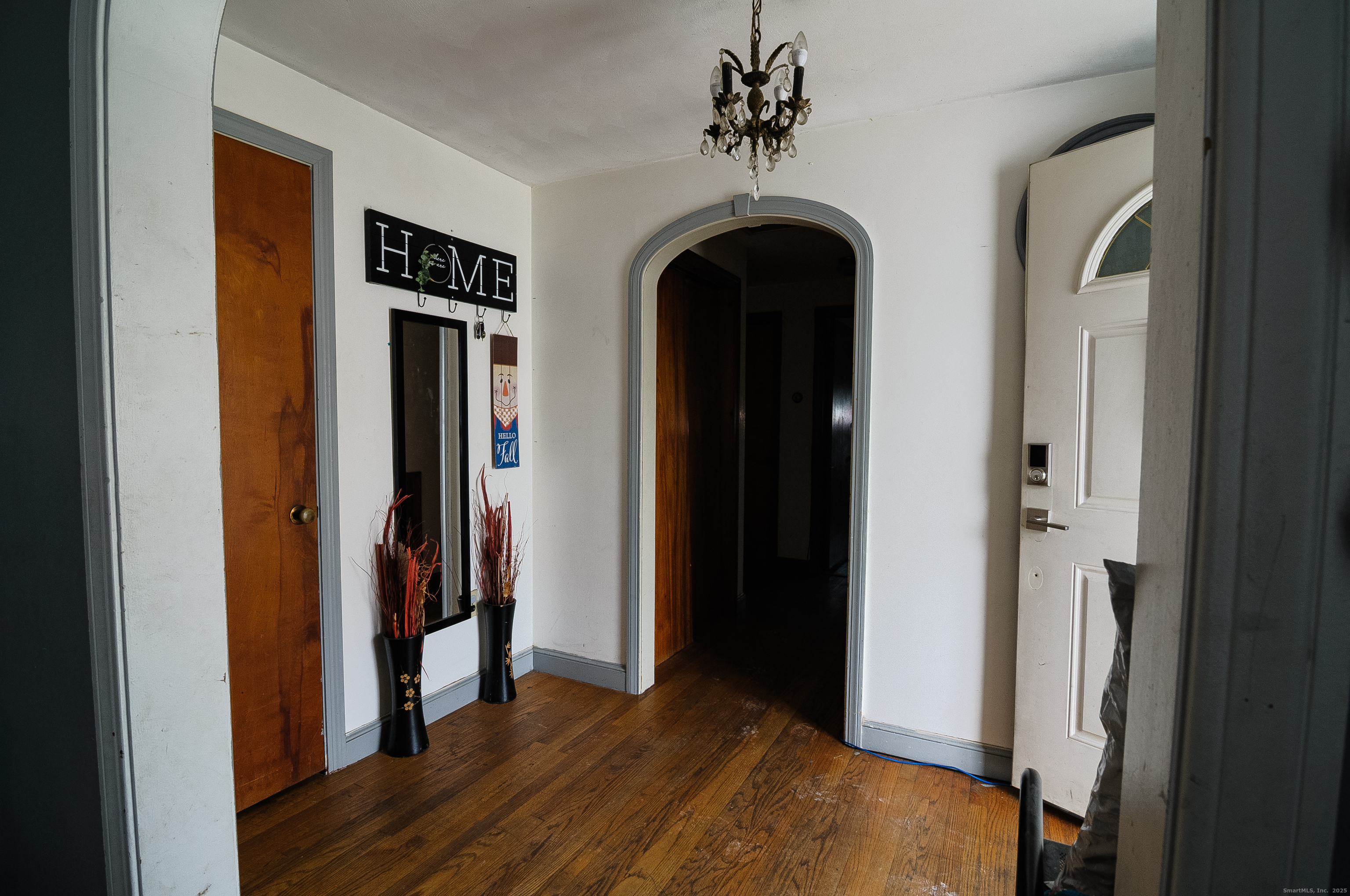 30 Adeline Avenue Bristol, CT 06010 - Photo 3 of 15 a view of a hallway with wooden floor and entryway