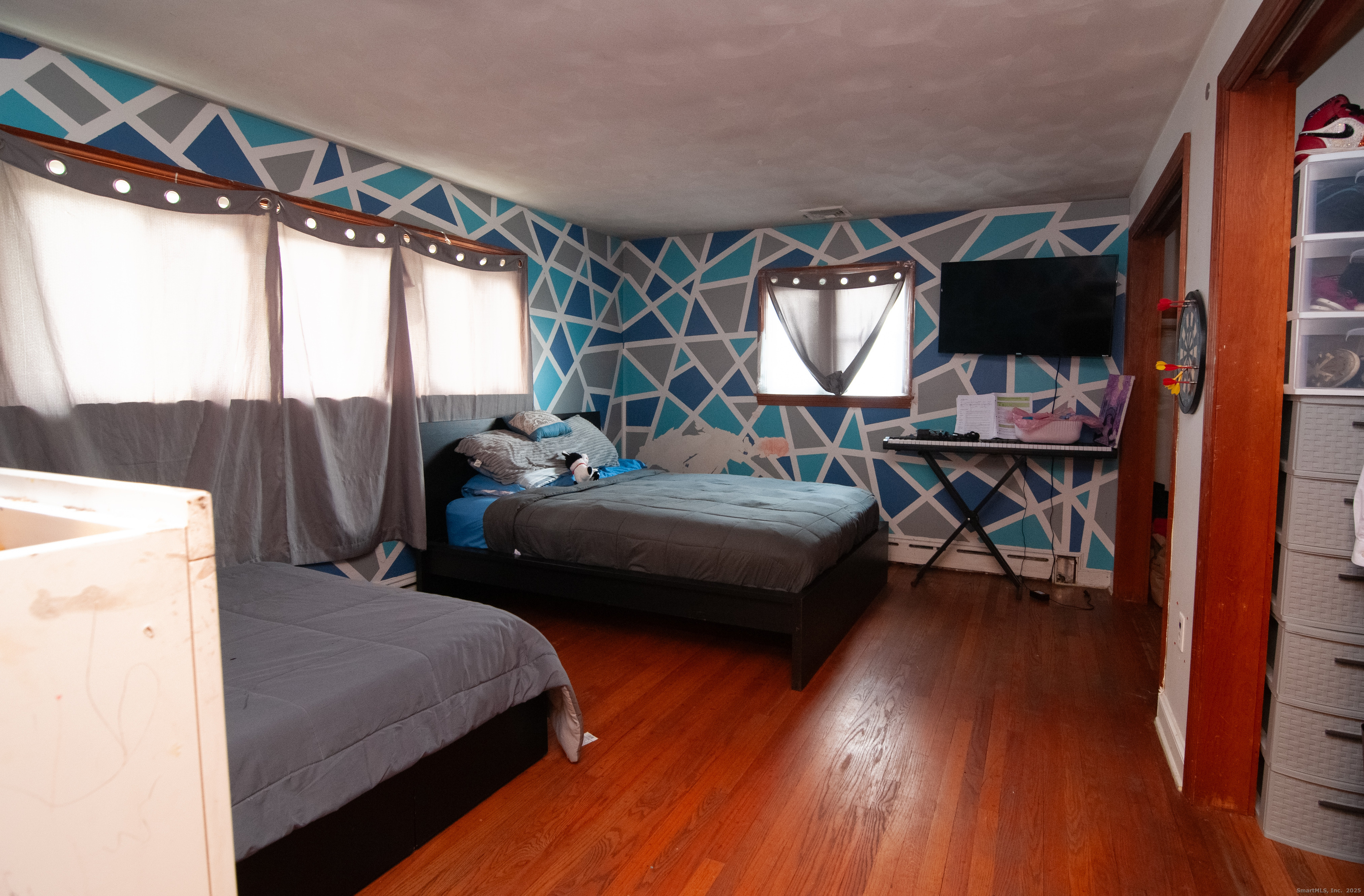 30 Adeline Avenue Bristol, CT 06010 - Photo 8 of 15 a bedroom with furniture and wooden floor