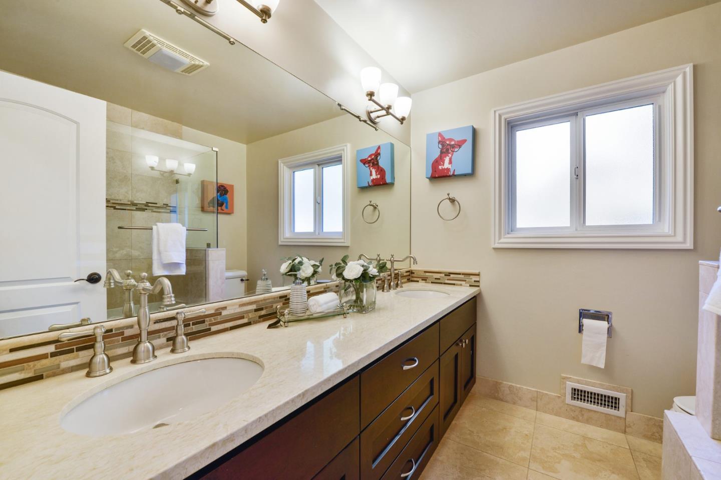 117 Worcester Loop Los Gatos, CA 95030 - Photo 16 of 47 a bathroom with a sink double vanity granite and a mirror