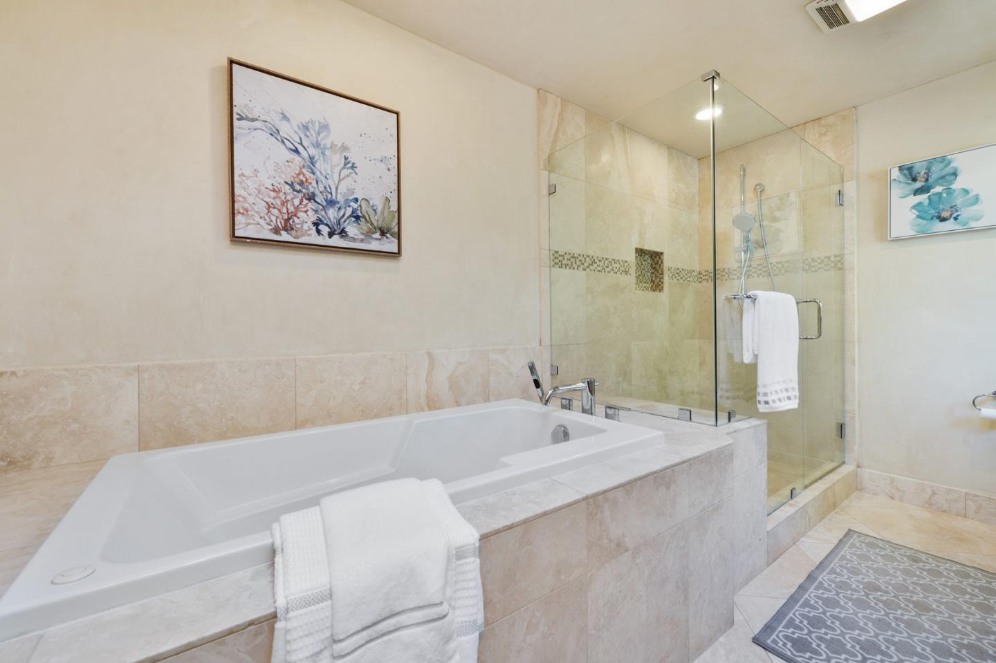 117 Worcester Loop Los Gatos, CA 95030 - Photo 20 of 47 a bathroom with a tub a sink and mirror