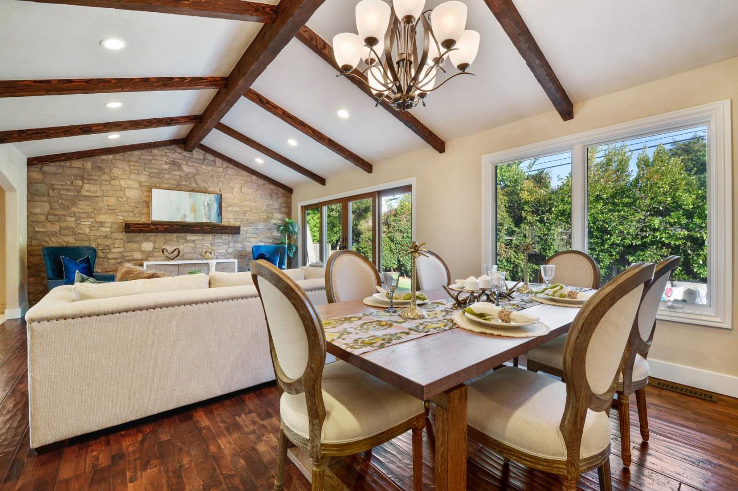 117 Worcester Loop Los Gatos, CA 95030 - Photo 34 of 47 a view of a dining room with furniture a chandelier and wooden floor