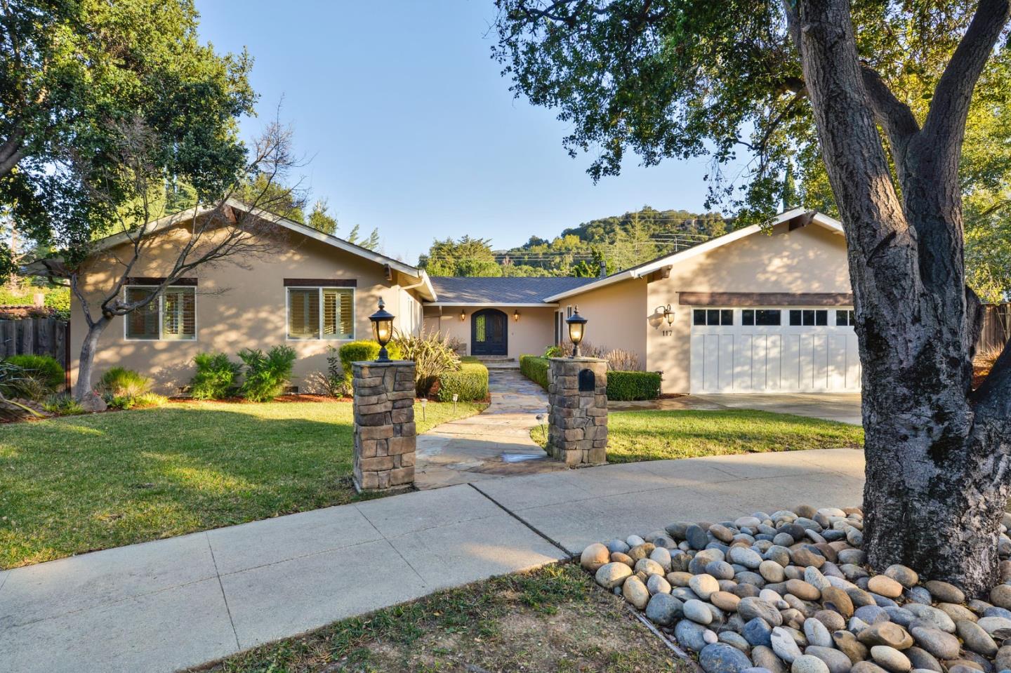 117 Worcester Loop Los Gatos, CA 95030 - Photo 40 of 47 a front view of a house with garden