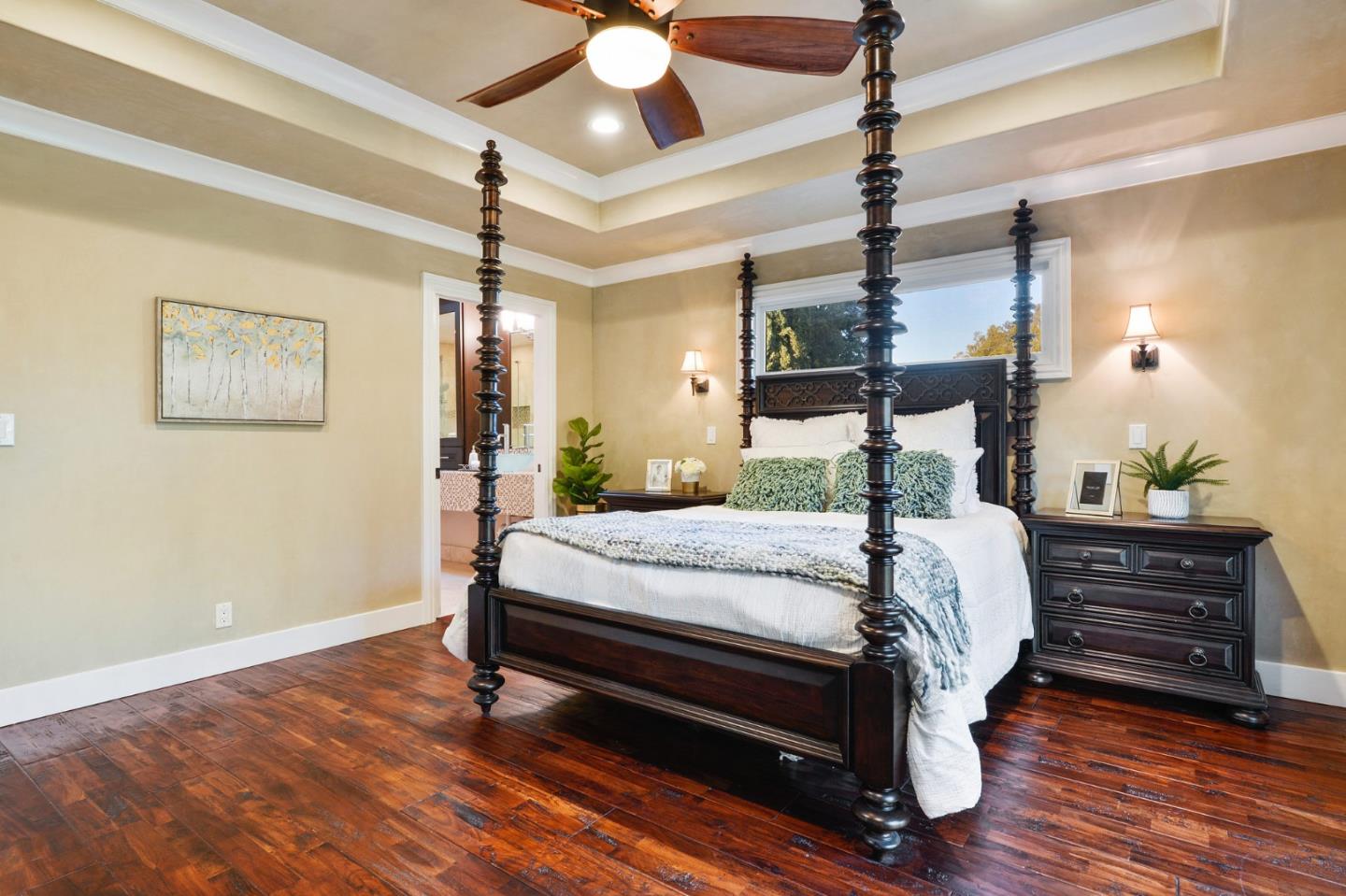 117 Worcester Loop Los Gatos, CA 95030 - Photo 7 of 47 a room with a bed and a chandelier