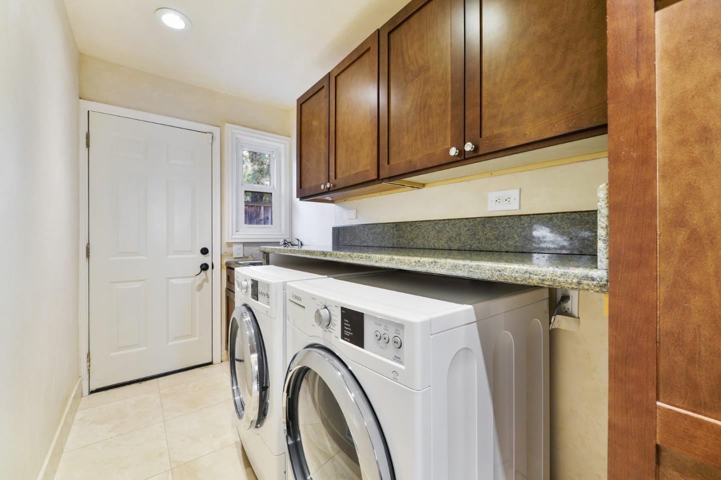 117 Worcester Loop Los Gatos, CA 95030 - Photo 10 of 47 a utility room with dryer and washer