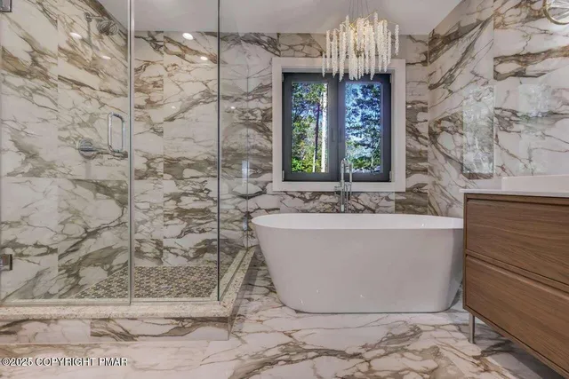 a view of a bathtub in a bathroom